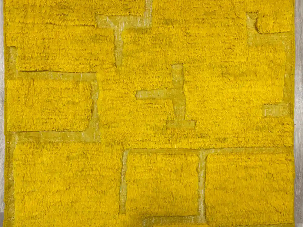 Zoom sur le centre du tapis Beni Ouarain montrant les motifs géométriques faits main.