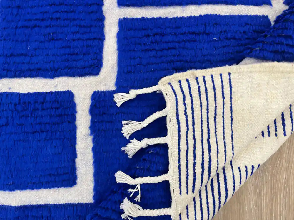 Dos d’un tapis Beni Ouarain authentique en laine naturelle, fait main