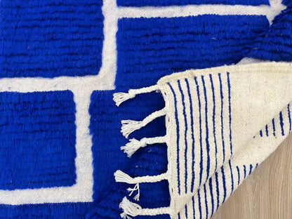 Dos d’un tapis Beni Ouarain authentique en laine naturelle, fait main