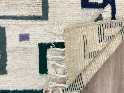 Dos d’un tapis berbère Beni Ouarain en laine naturelle, tissé main