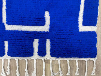 Franges faites main d’un tapis Beni Ouarain unique, authentique en laine naturelle