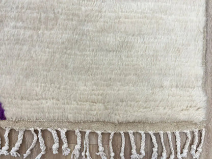 Franges nouées à la main du tapis en laine Beni Ouarain, finition artisanale du Haut Atlas marocain.