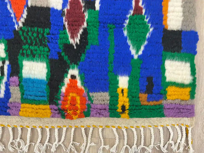 Franges d’un tapis berbère Azilal en laine naturelle, fait main au Maroc