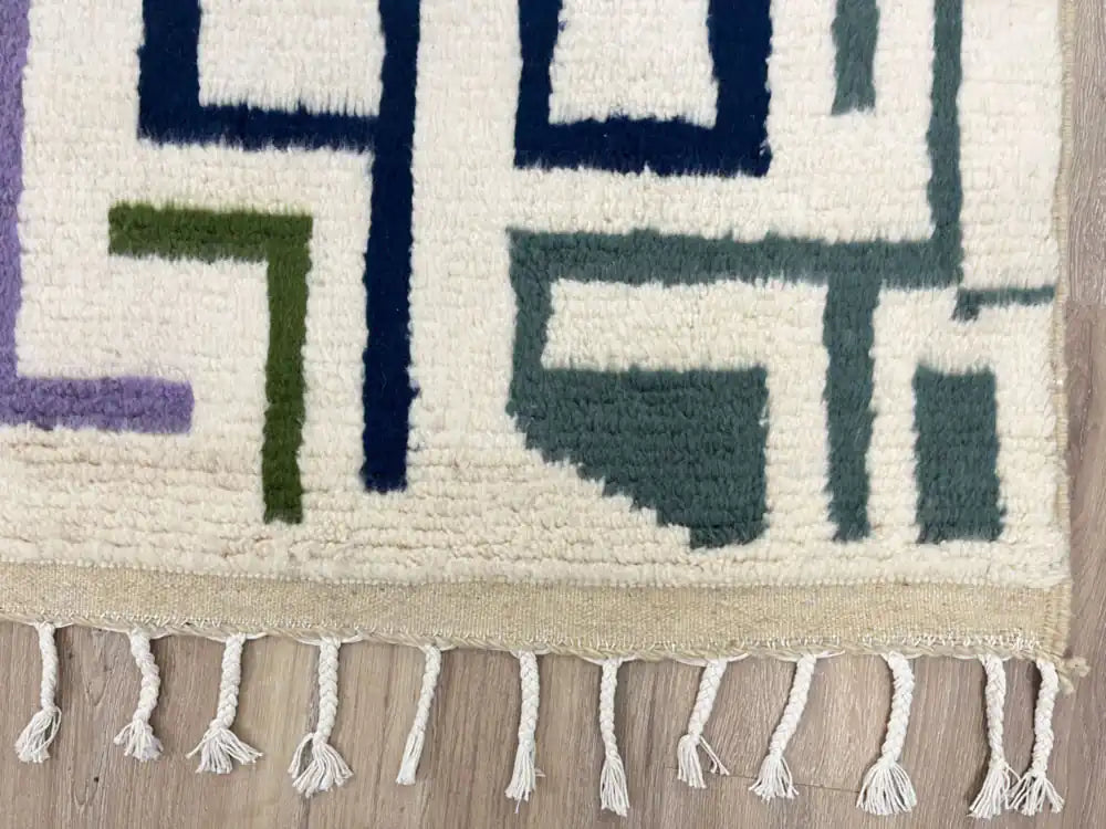 Franges d’un tapis berbère Beni Ouarain en laine naturelle