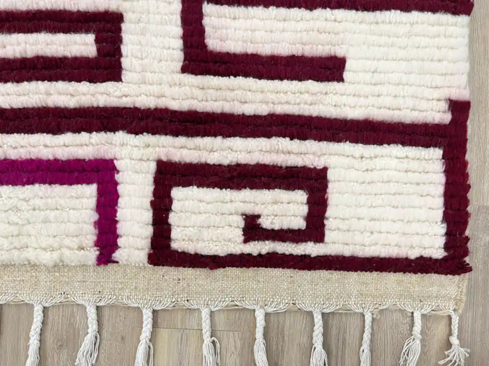 Franges d’un tapis Azilal marocain en laine authentique, finition artisanale fait main