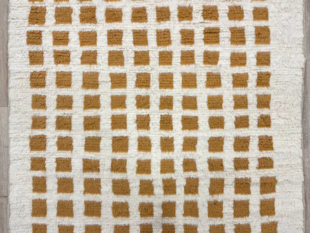 Motifs géométriques d’un tapis Beni Ouarain authentique en laine naturelle