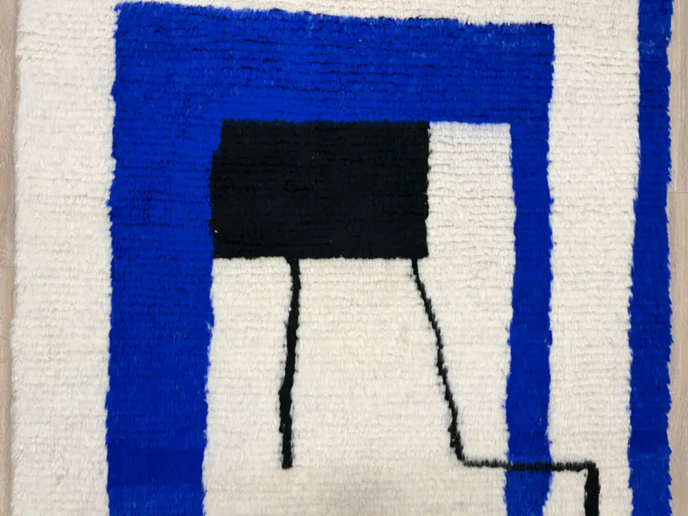 tapis Beni Ouarain motifs géométriques écru et lignes jaunes