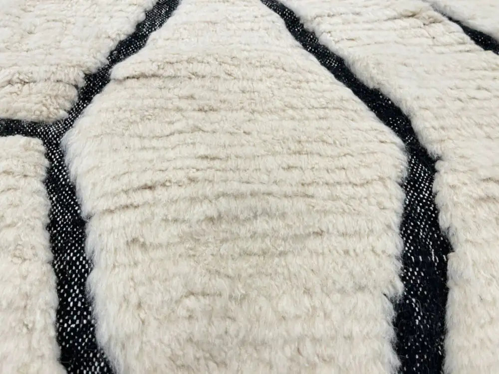 Zoom texture douce laine tapis berbère marocain